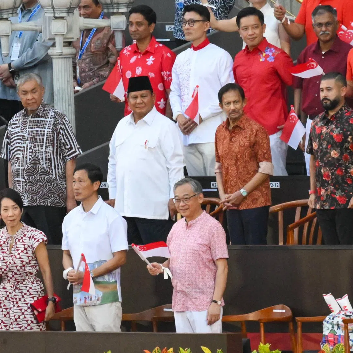 (Centre row, from left) Malaysia’s Deputy Prime Minister and Minister of Rural and Regional Development Zahid Hamidi, Indonesian President Prabowo Subianto, Brunei’s Sultan Hassanal Bolkiah and the Regent of Johor Tunku Ismail and his spouse in attendance at National Day Parade on Aug 9.