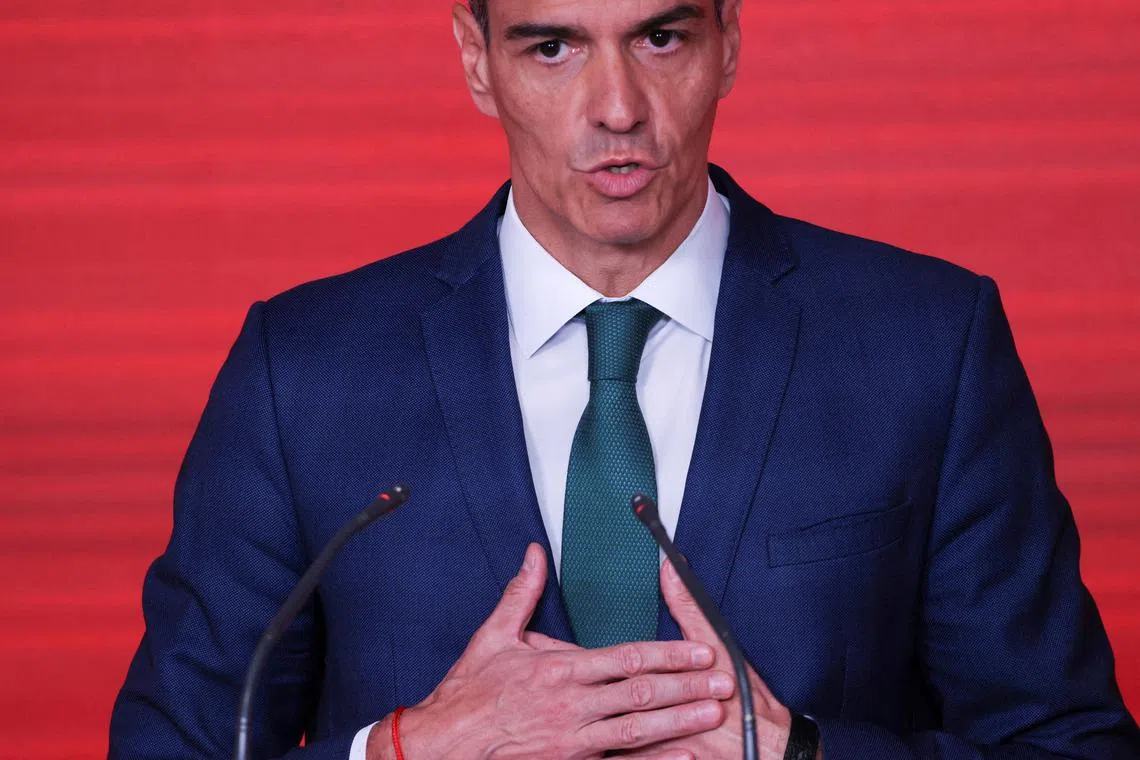 FILE PHOTO: Spain's Prime Minister Pedro Sanchez, who is also a leader of the Socialist ruling party (PSOE), holds a press conference at headquarters in Madrid, Spain June 16, 2025. REUTERS/Nacho Doce/File Photo