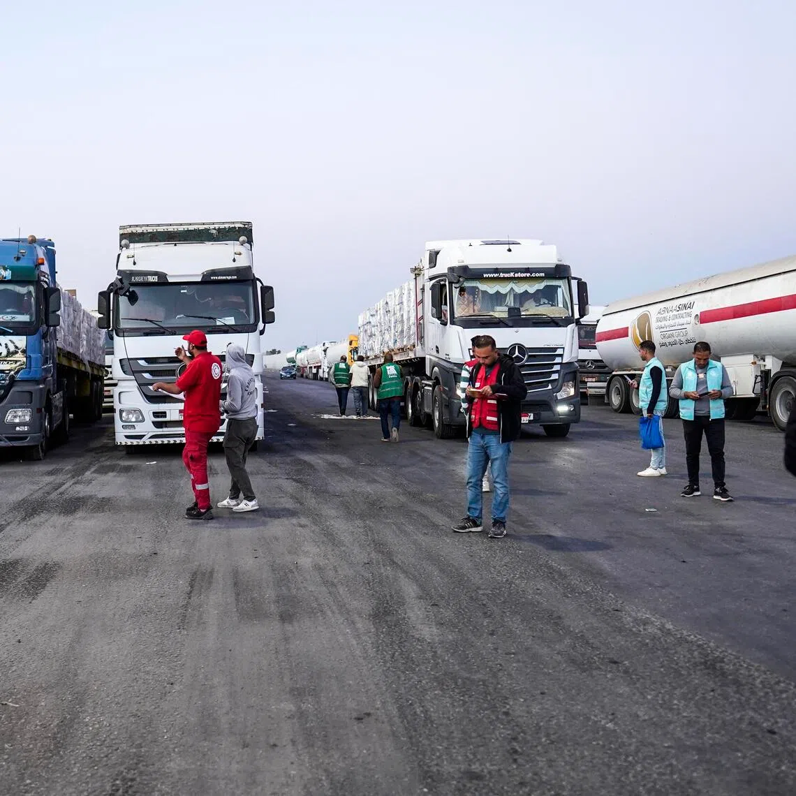 Humanitarian aid trucks queue to enter the Rafah border crossing, between Egypt and the Gaza Strip, on Oct 20.