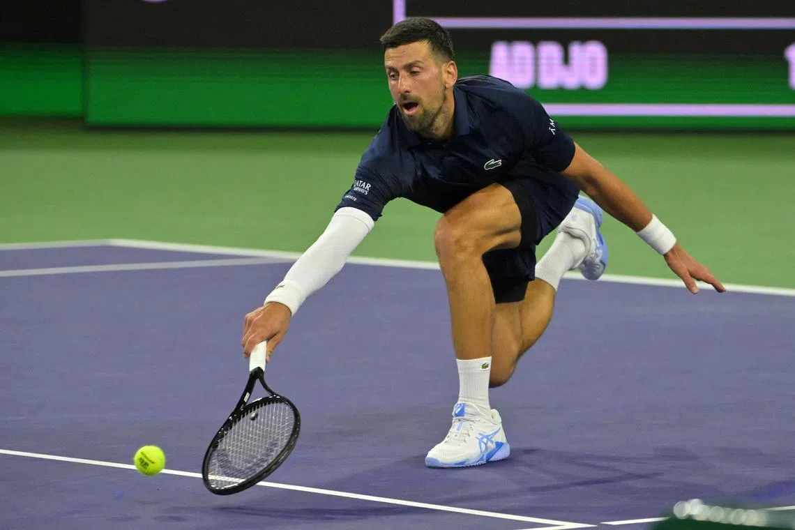 Mar 11, 2026; Indian Wells, CA, USA;  Novak Djokovic (SRB) reaches for a drop shot during his fourth round match against Jack Draper (GBR) in the BNP Paribas Open at the Indian Wells Tennis Garden. Mandatory Credit: Jayne Kamin-Oncea-Imagn Images