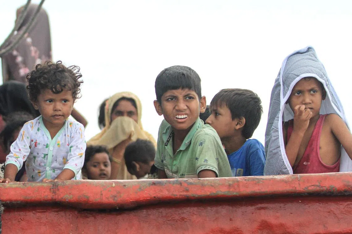 Rohingya refugee children are seen on a boat, after Rohingya refugees, mostly women and children, got stranded due to a boat engine failure in the waters of South Aceh, Aceh province, Indonesia, October 20, 2024, in this photo taken by Antara Foto. Antara Foto/Syifa Yulinnas/via REUTERS/File Photo
