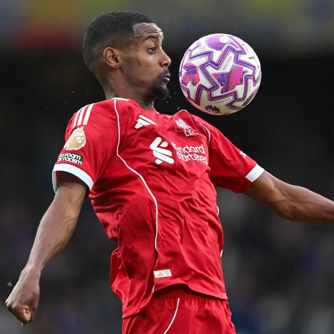 Alexander Isak of Liverpool controling the ball during the English Premier League match between Chelsea and Liverpool. .