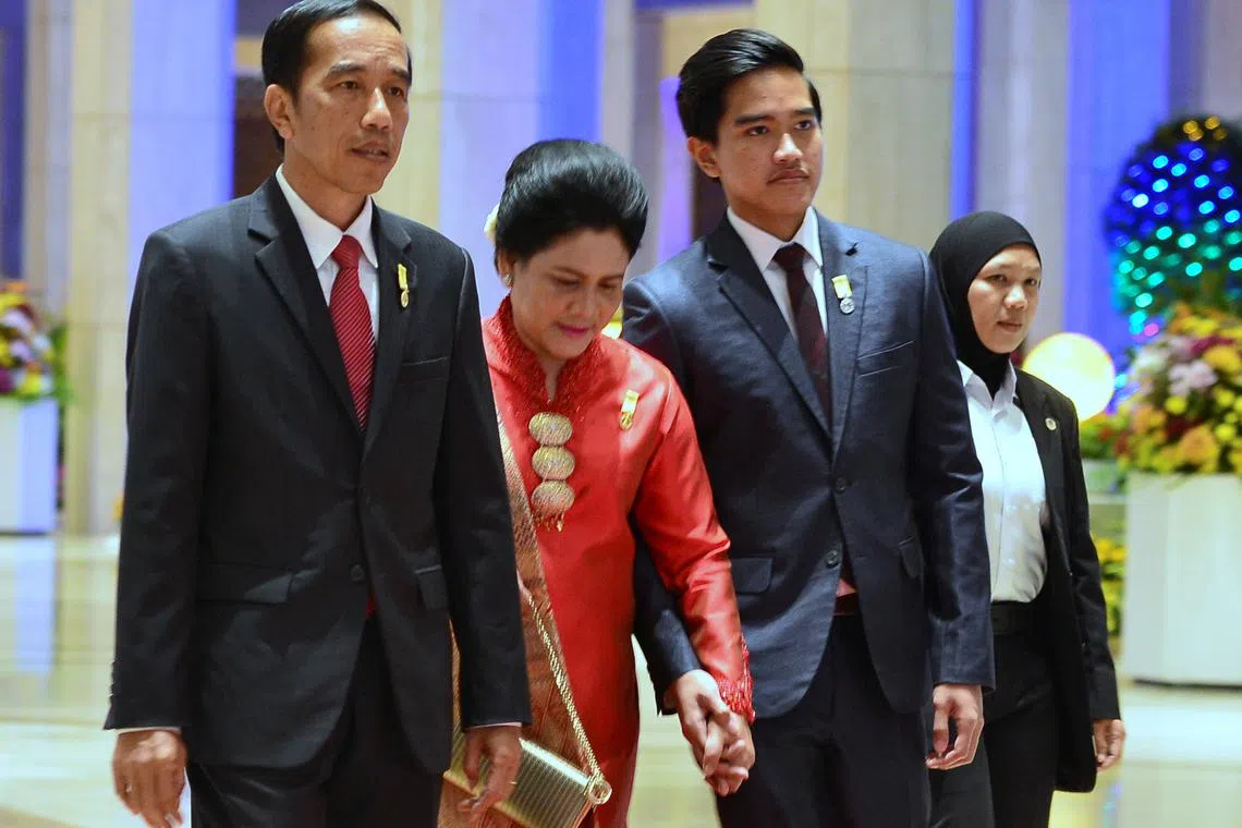 FILE PHOTO: Indonesia's President Joko Widodo, his wife Iriana and son Kaesang Pangarep arrive for the royal banquet of Brunei's Sultan Hassanal Bolkiah at Nurul Iman Palace in Bandar Seri Begawan, Brunei October 6, 2017. REUTERS/Ahim Rani/File Photo