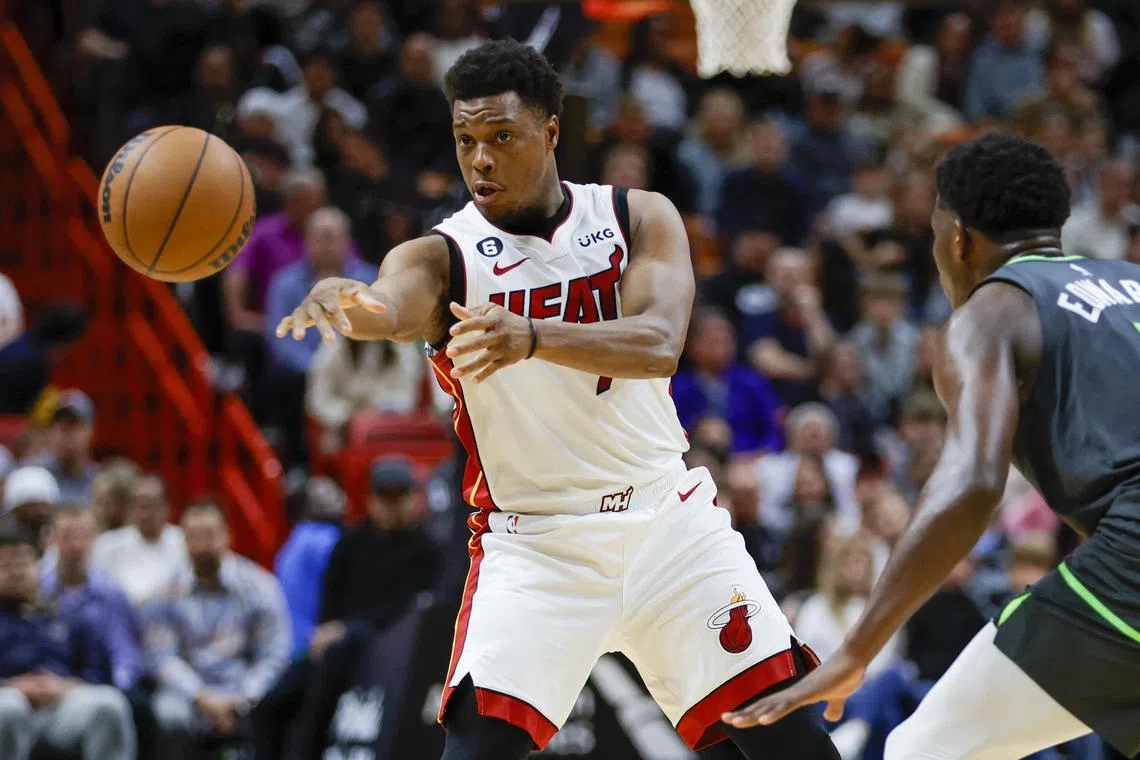 Miami Heat guard Kyle Lowry passing the basketball during the second quarter against the Minnesota Timberwolves at FTX Arena on Monday. Lowry’s steal in the closing seconds helped the Heat seal a 113-110 win.