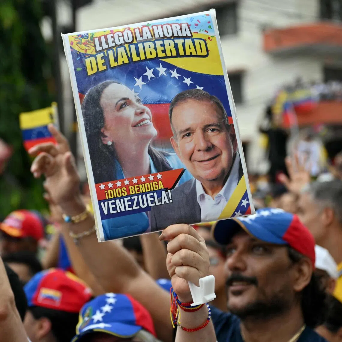 A placard depicting Venezuelan opposition leader Maria Corina Machado and former presidential candidate Edmundo Gonzalez is pictured ahead of a rally with members of the Venezuelan diaspora.