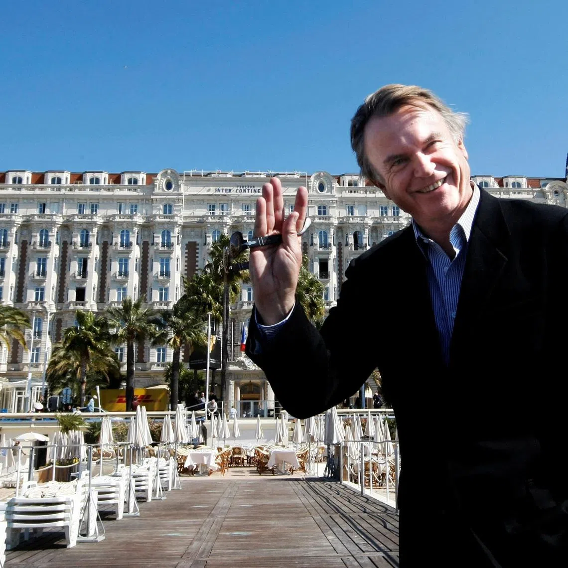 FILE PHOTO: Actor Sam Neill poses during a photocall at the yearly MIPTV, the International Television Programs Market in Cannes, southeastern France, April 7, 2008.  REUTERS/Eric Gaillard/File Photo