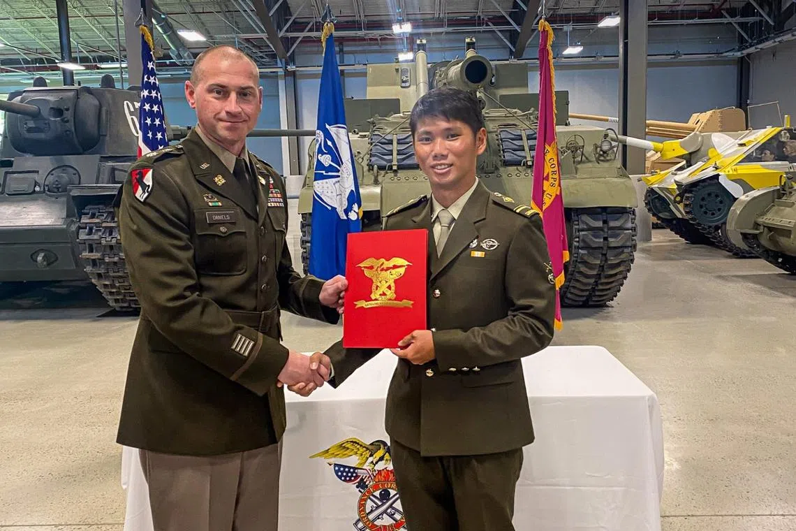 me4 and saf engineering scholar receiving innduction certificate from ltc jonathan a. daniels for completing a 16 week ordnance basic officer leader course in 2024 at us army ordnance school in virginia