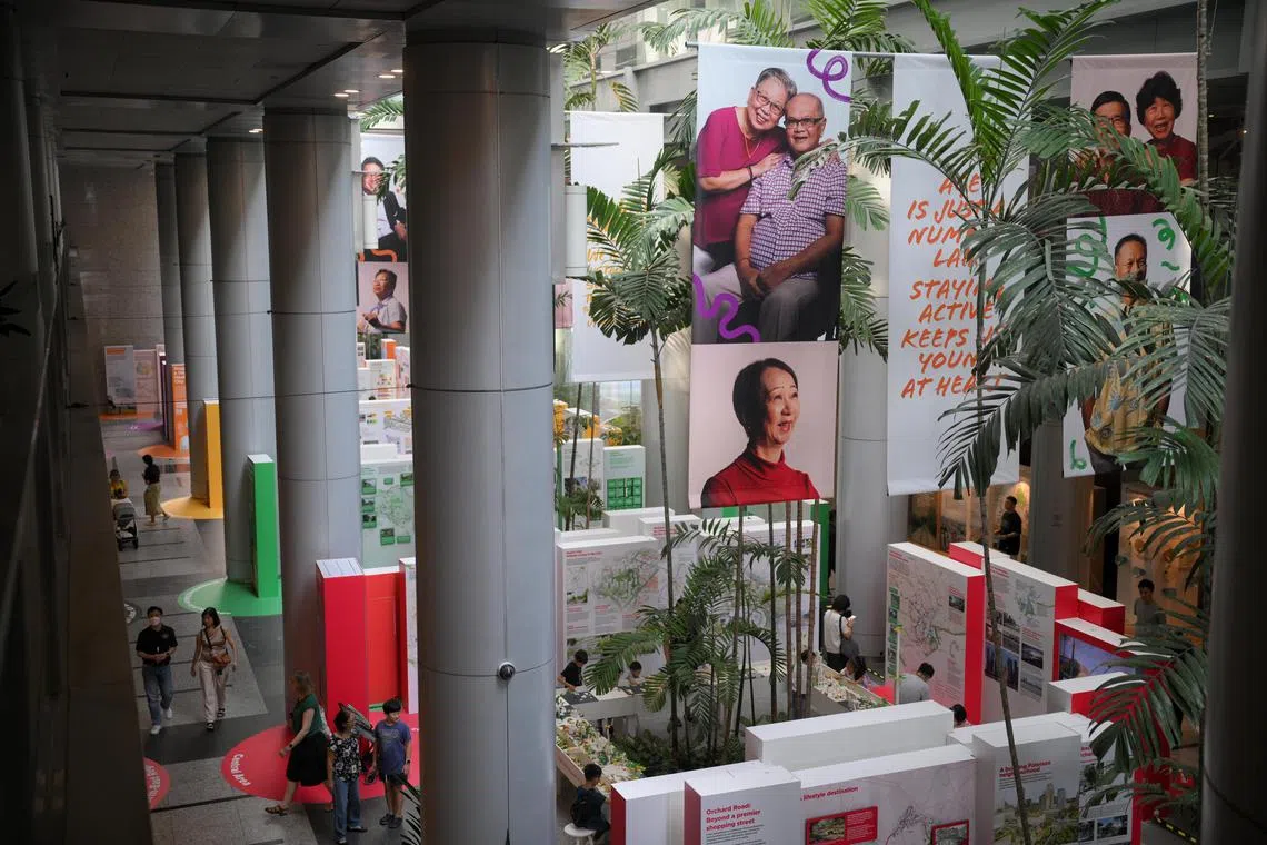 Promotional posters seen inside URA Centre?s atrium on June 27, 2025.