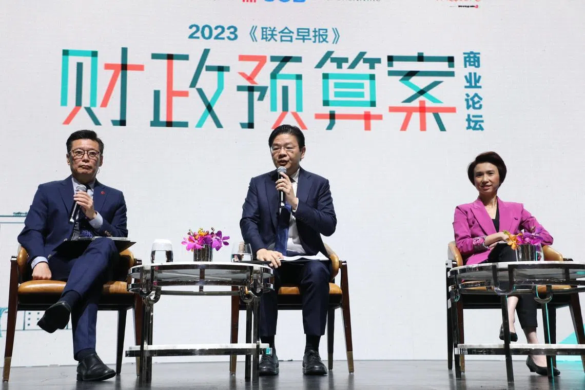 (From left) Forum moderator and Lianhe Zaobao editor Goh Sin Teck, Deputy Prime Minister Lawrence Wong and Minister of State for Trade and Industry Low Yen Ling.