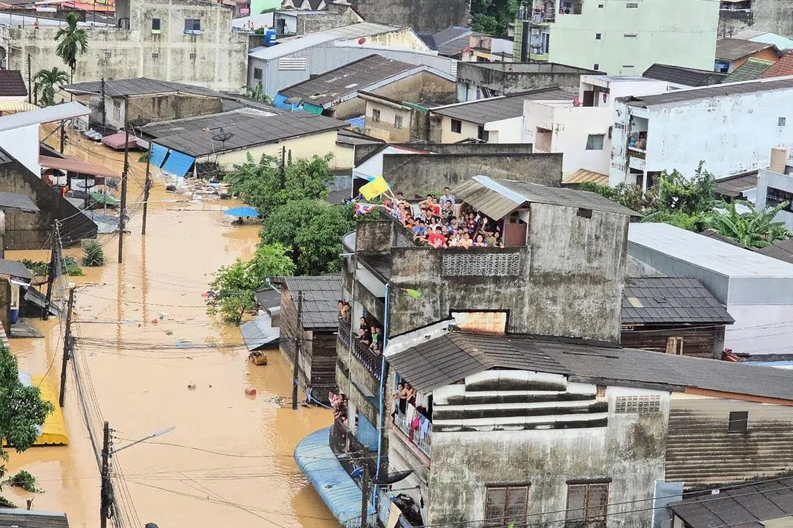 Thailand to use drones to boost flood relief efforts; death toll climbs in Indonesia