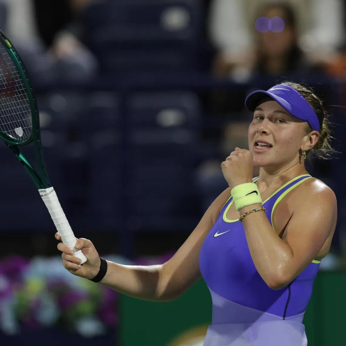 Second-seed Amanda Anisimova of the US celebrates ousting Russia's Mirra Andreeva with a comeback 2-6, 7-5, 7-6 (7/4) victory.