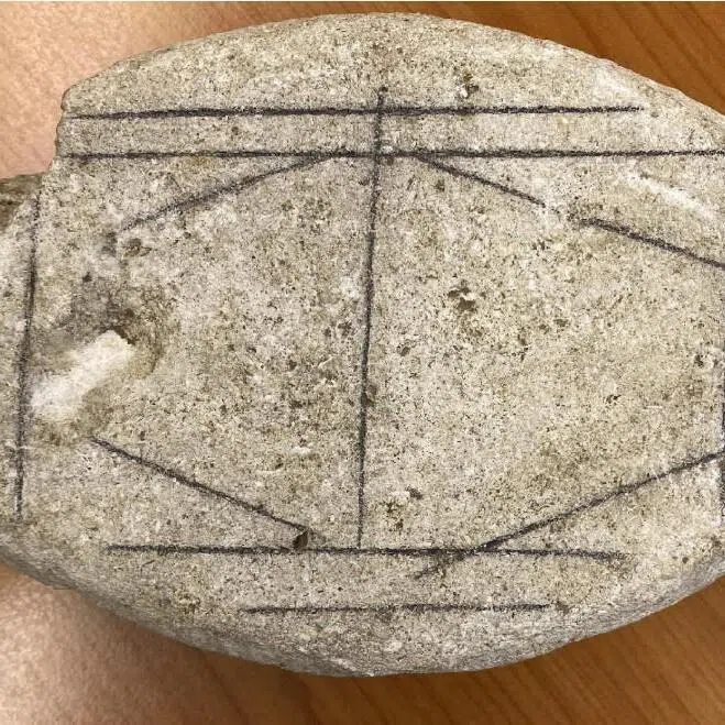 Scientists used artificial intelligence to figure out that this stone found in the Netherlands is an ancient board game.