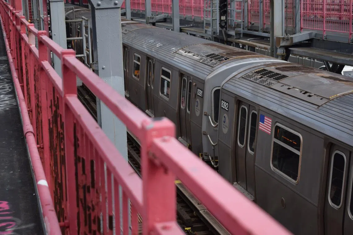 The gunman at one point got on a train in the station but then got off, and he was tackled by bystanders before being taken into custody.