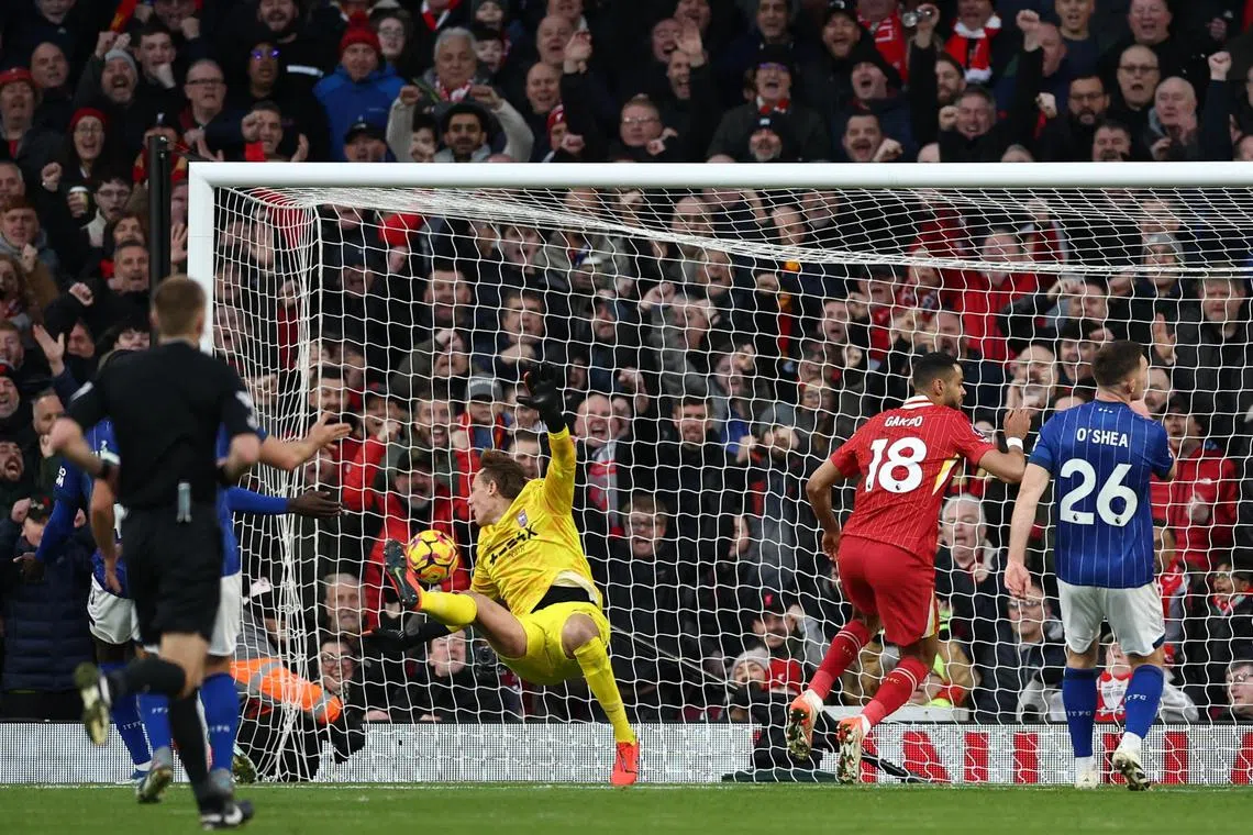 Liverpool's Cody Gakpo scoring their fourth goal - his second - against Ipswich Town on Jan 25.