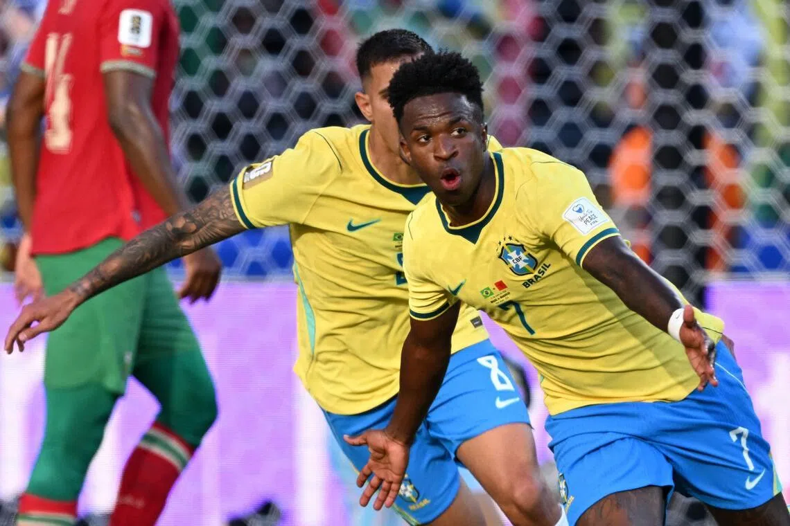 Brazil's forward Vinicius Junior celebrates scoring his team's first goal during the 2026 World Cup Group C football match between Brazil and Morocco at the New York/New Jersey Stadium.