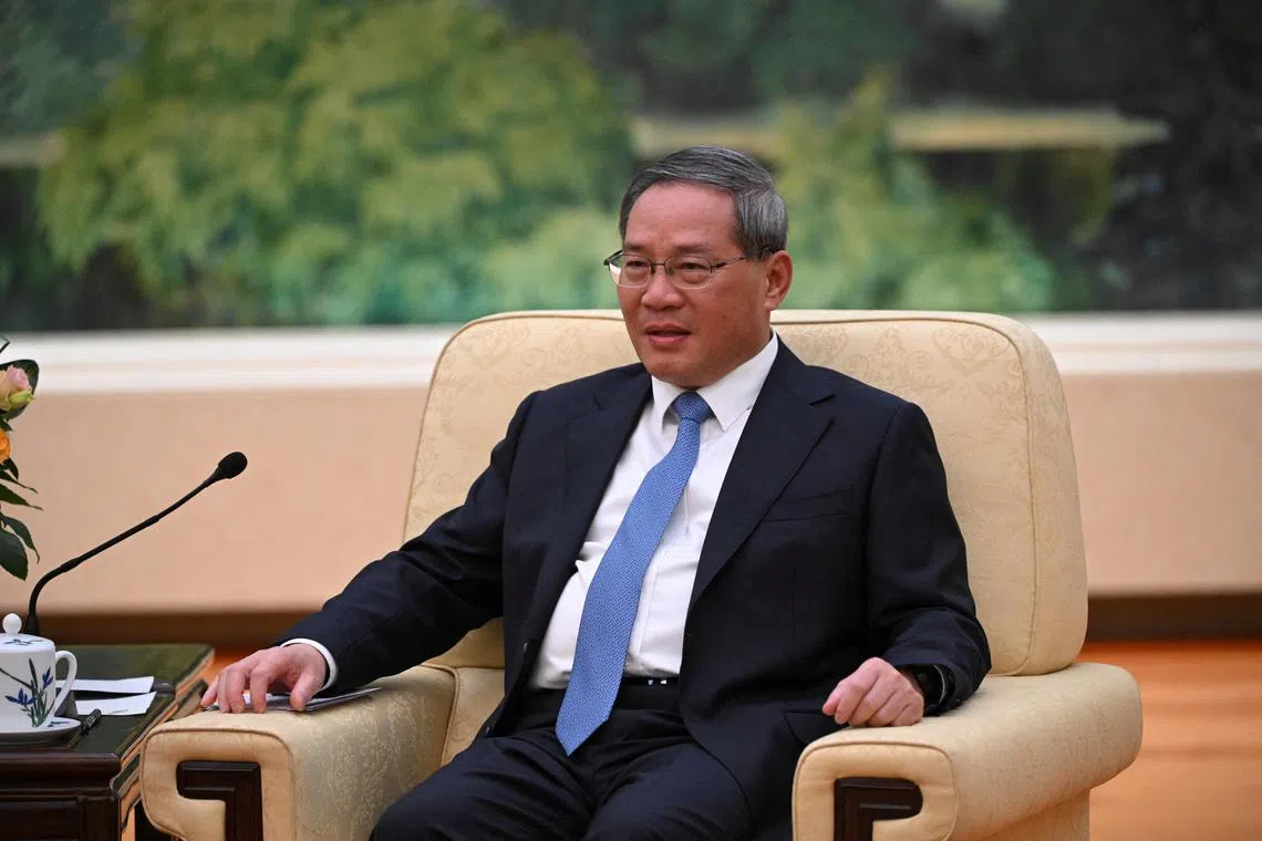 FILE PHOTO: China’s Premier Li Qiang attends a meeting with France’s Minister for Foreign and European Affairs Stephane Sejourne (not pictured) at the Great Hall of the People in Beijing on April 1, 2024.    Pedro Pardo/Pool via REUTERS/File Photo