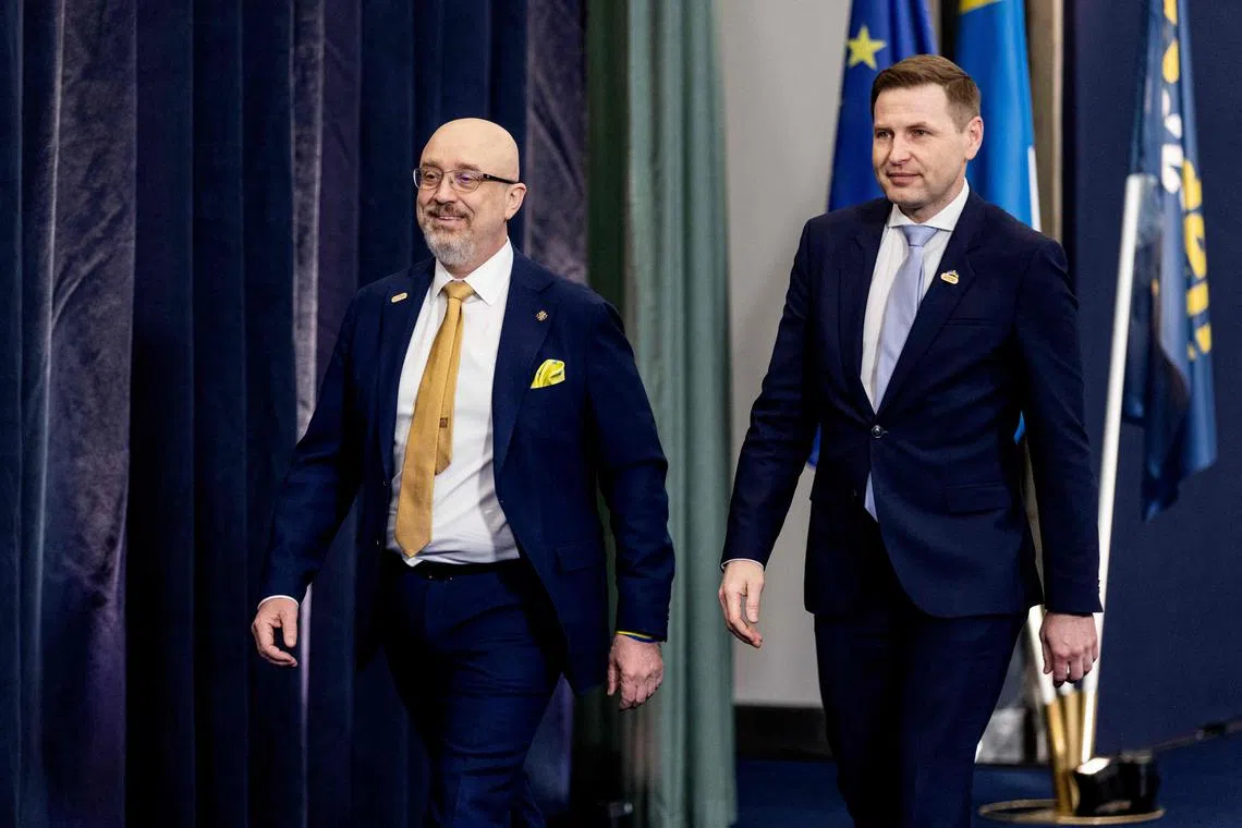 Ukrainian Defence Minister Oleksiy Reznikov (left) arrives for the meeting, with Mr Hanno Pevkur, Estonia's Minister of Defence.