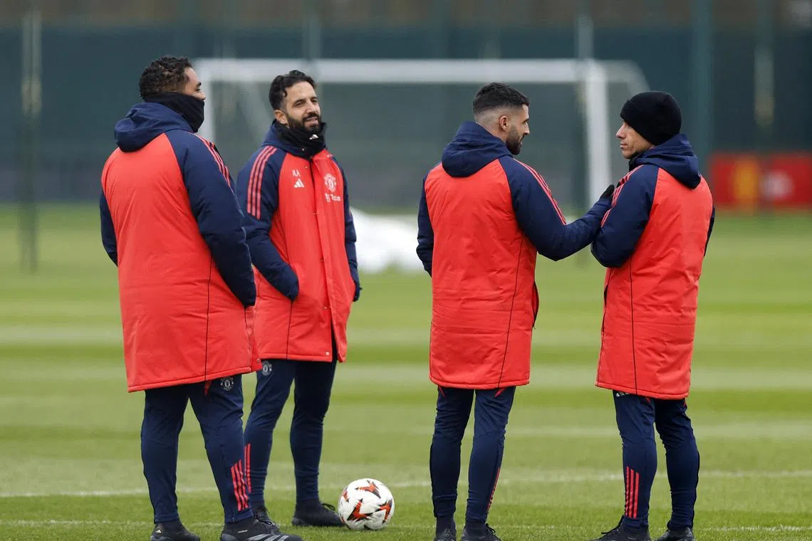 Manchester United manager Ruben Amorim (second from left) and his staff during a training session.