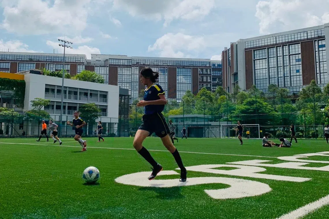 Methodist Girls’ School footballer Caitlin Goh in action during a match against Spectra Secondary School on Nov 12. 