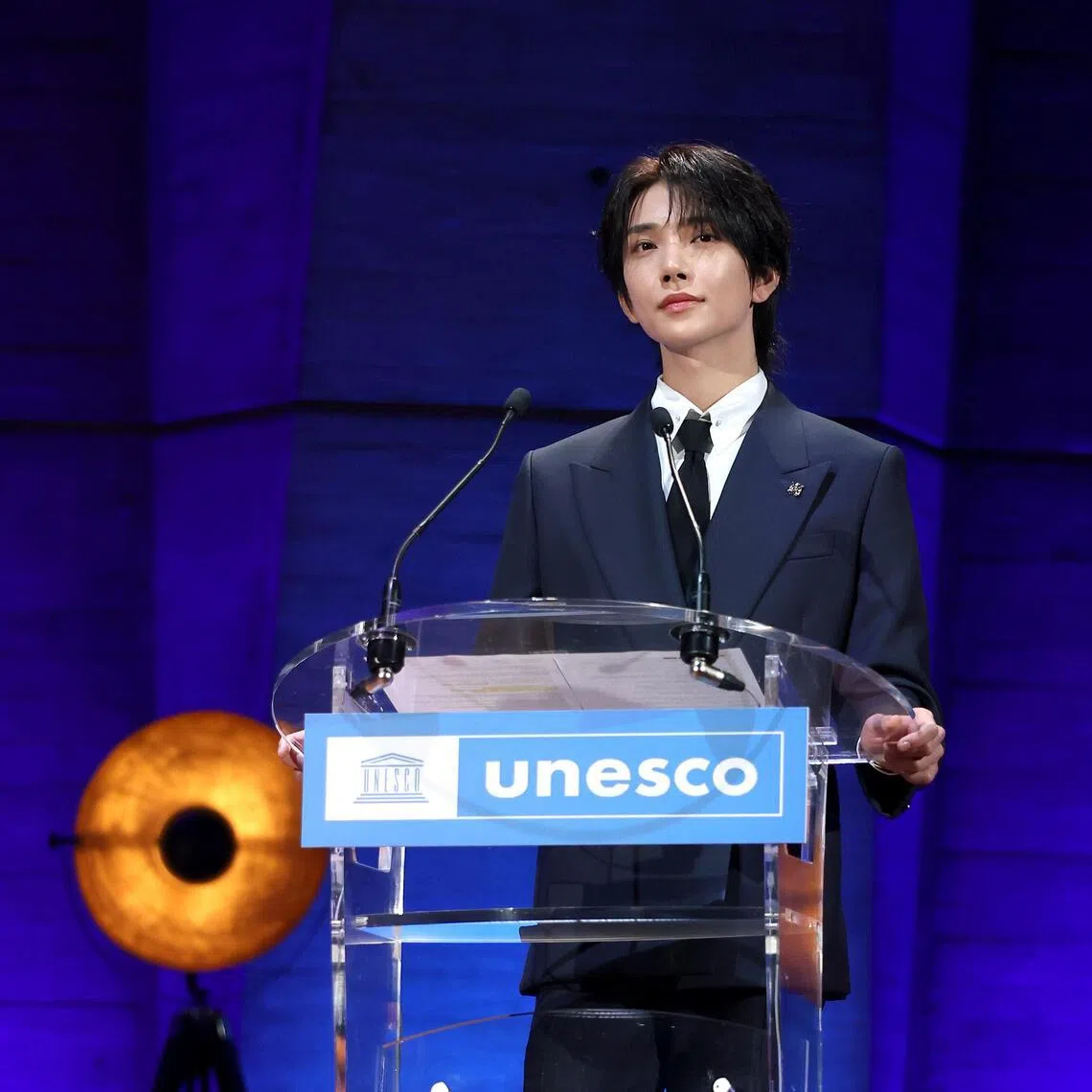 PARIS, FRANCE - JUNE 25: Joshua Hong gives a speech during the launch of the Global Youth Grant Scheme Scale-Up Phase at UNESCO on June 25, 2026 in Paris, France. (Photo by Aurore Marechal/Getty Images)