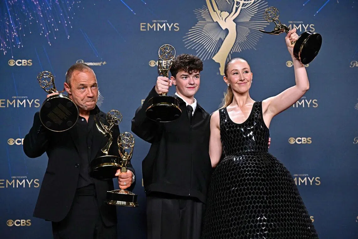 (From left) Adolescence actor and co-creator Stephen Graham poses in the press room with the awards for Outstanding Limited or Anthology Series, Outstanding Lead Actor in a Limited or Anthology Series or Movie, Outstanding Writing for a Limited Series or Anthology Series or Movie for Adolescence, actor Owen Cooper won Outstanding Supporting Actor in a Limited or Anthology Series or Movie and actress Erin Doherty won Outstanding Supporting Actress in a Limited or Anthology Series or Movie during the 77th Primetime Emmy Awards in Los Angeles on Sept 14, 2025. 
