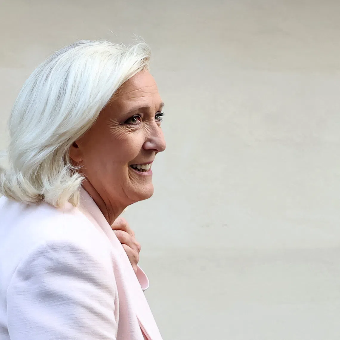 French far-right leader Marine Le Pen, member of parliament for the Rassemblement National (National Rally - RN) party, leaves after a party meeting at the Rassemblement National headquarters in Paris, France, July 7, 2026. REUTERS/Stephane Mahe