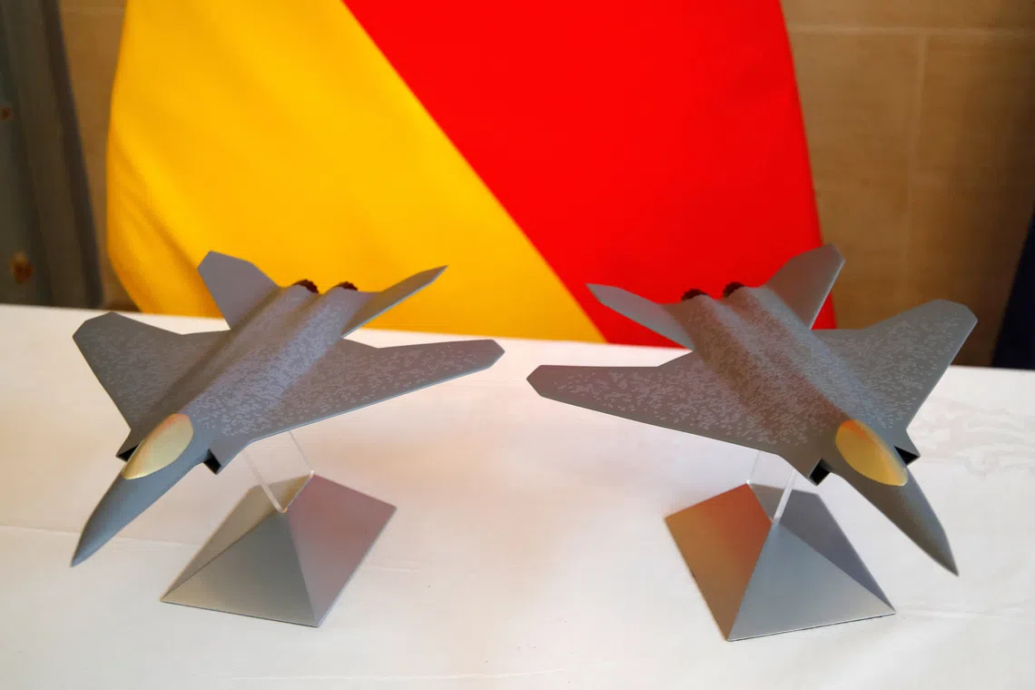 FILE PHOTO: Scale models of the Franco-German-Spanish Future Combat Air System (FCAS / SCAF), Europe's next-generation fighter jet, are seen in Paris, France, February 20, 2020. REUTERS/Charles Platiau/File Photo