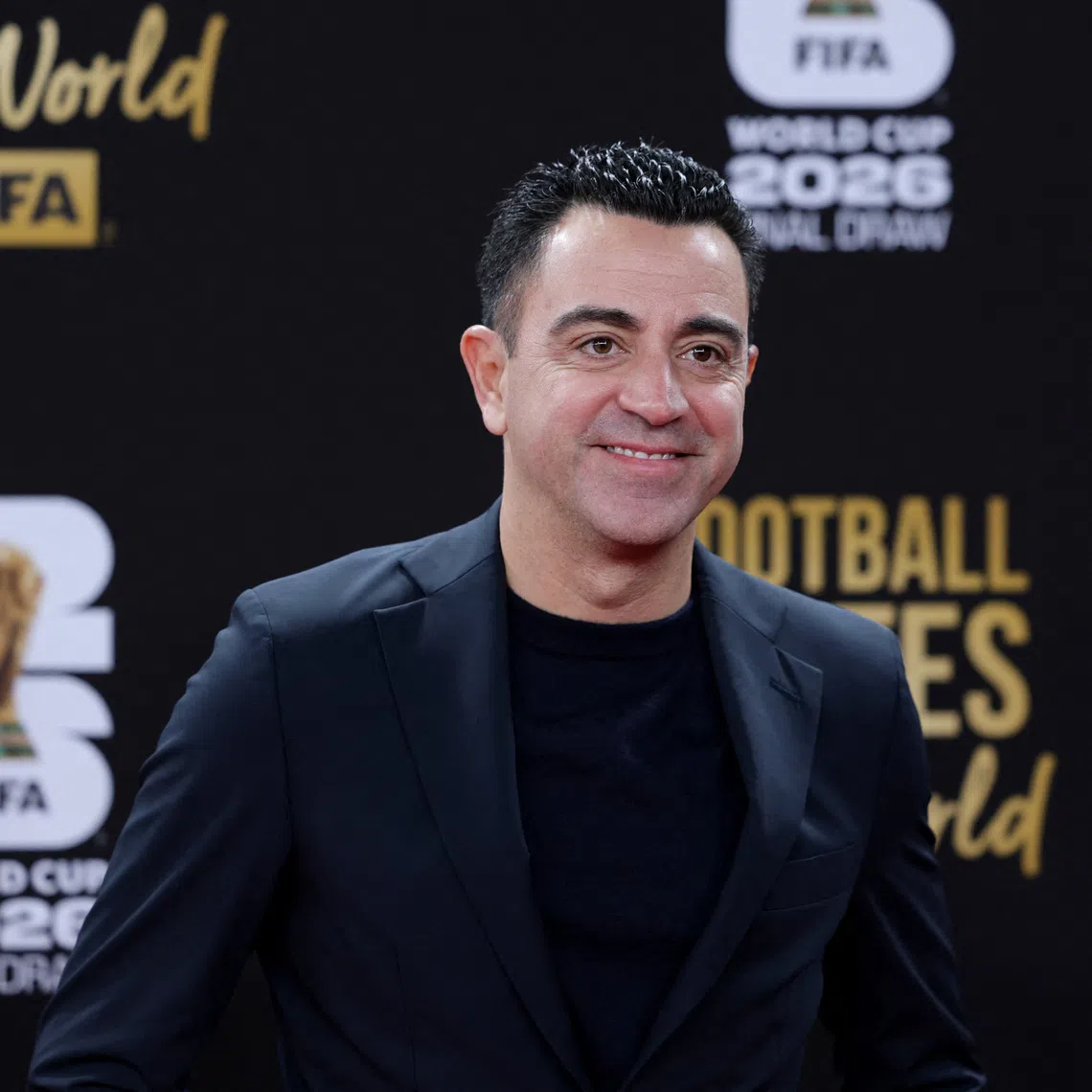 Soccer Football - FIFA 2026 World Cup Draw Welcome Reception - Hall of Nations, John F. Kennedy Memorial Center for the Performing Arts, Washington D.C., District of Columbia, U.S. - December 4, 2025 Xavi Hernandez arrives at the Welcome Reception ahead of the FIFA 2026 World Cup Draw REUTERS/Jeenah Moon