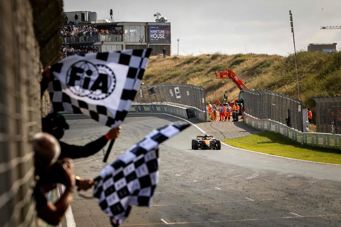McLaren's British driver Lando Norris drives to win the Formula One Dutch Grand Prix at The Circuit Zandvoort, western Netherlands, on August 23, 2026. (Photo by Sem van der Wal / ANP / AFP) / Netherlands OUT