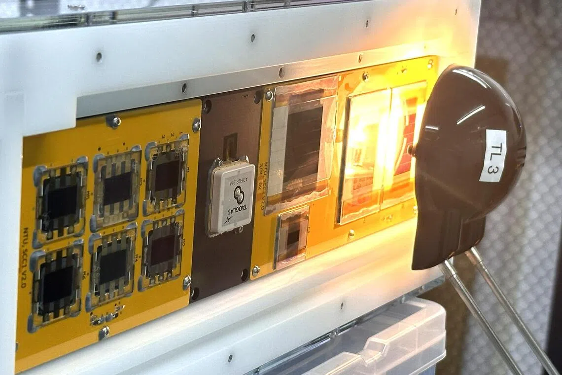 sbspace02 - Close-up of the CRIMSON-1 satellite, where the various perovskite solar cells are being tested at a lab facility.

 Credit to: NTU Singapore