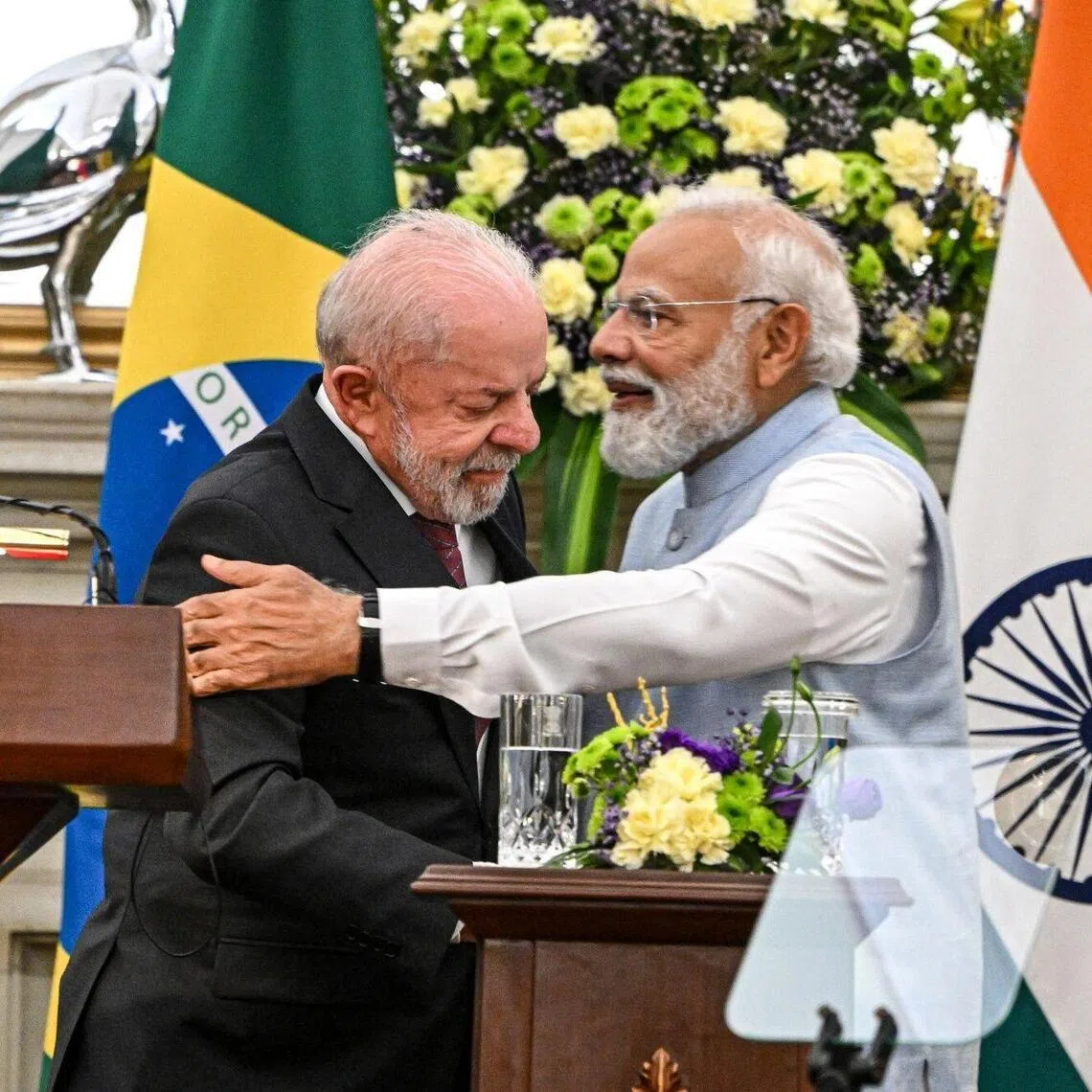 India's Prime Minister Narendra Modi (right) and Brazil's President Luiz Incio Lula da Silva embrace during a news conference in New Delhi, India, on Feb 21, 2026.