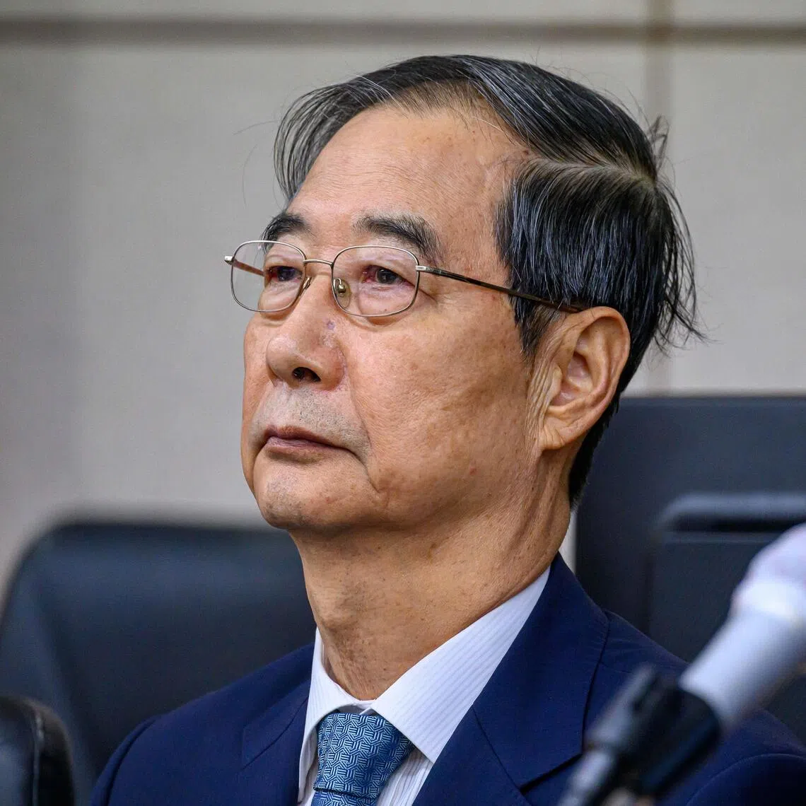 Former prime minister Han Duck-soo attends the first hearing of his trial on Sept 30, 2025.
