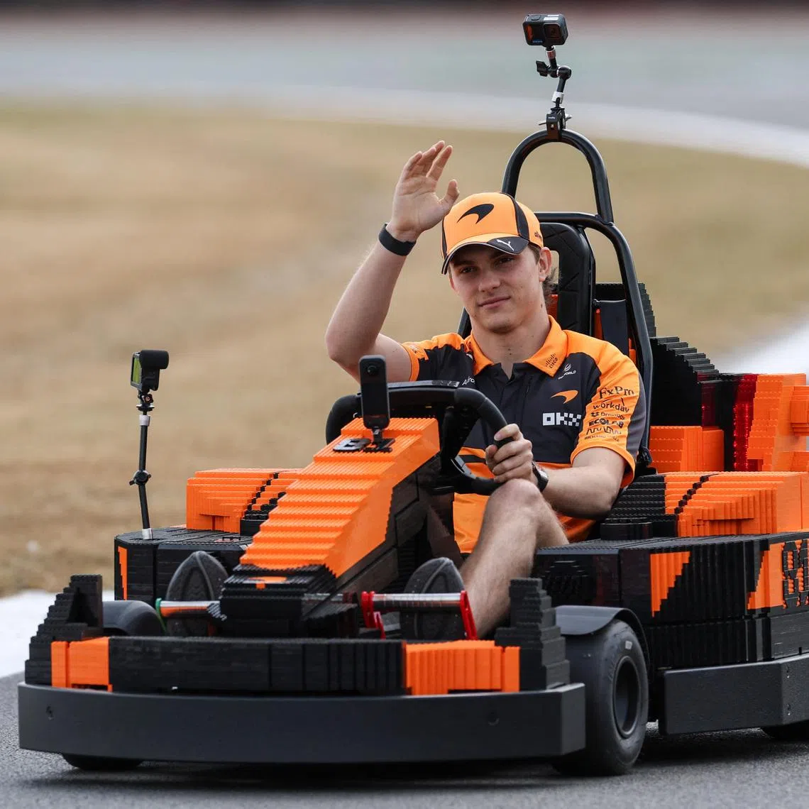 Formula One F1 - British Grand Prix - Silverstone Circuit, Silverstone, Britain - July 5, 2026 McLaren's Oscar Piastri in a car made of Lego blocks ahead of the race REUTERS/Andrew Boyers