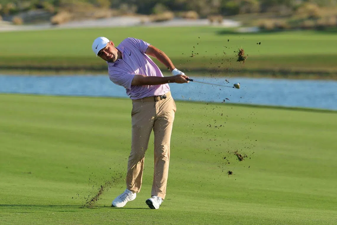 Scottie Scheffler of the United States plays a shot on the 18th hole during the second round of the Hero World Challenge.