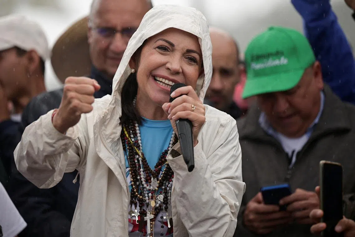 FILE PHOTO: Venezuelan opposition leader Maria Corina Machado gives a speech to supporters during a campaign rally for the presidential election, in Merida state, Venezuela June 26, 2024. REUTERS/Gaby Oraa/File Photo