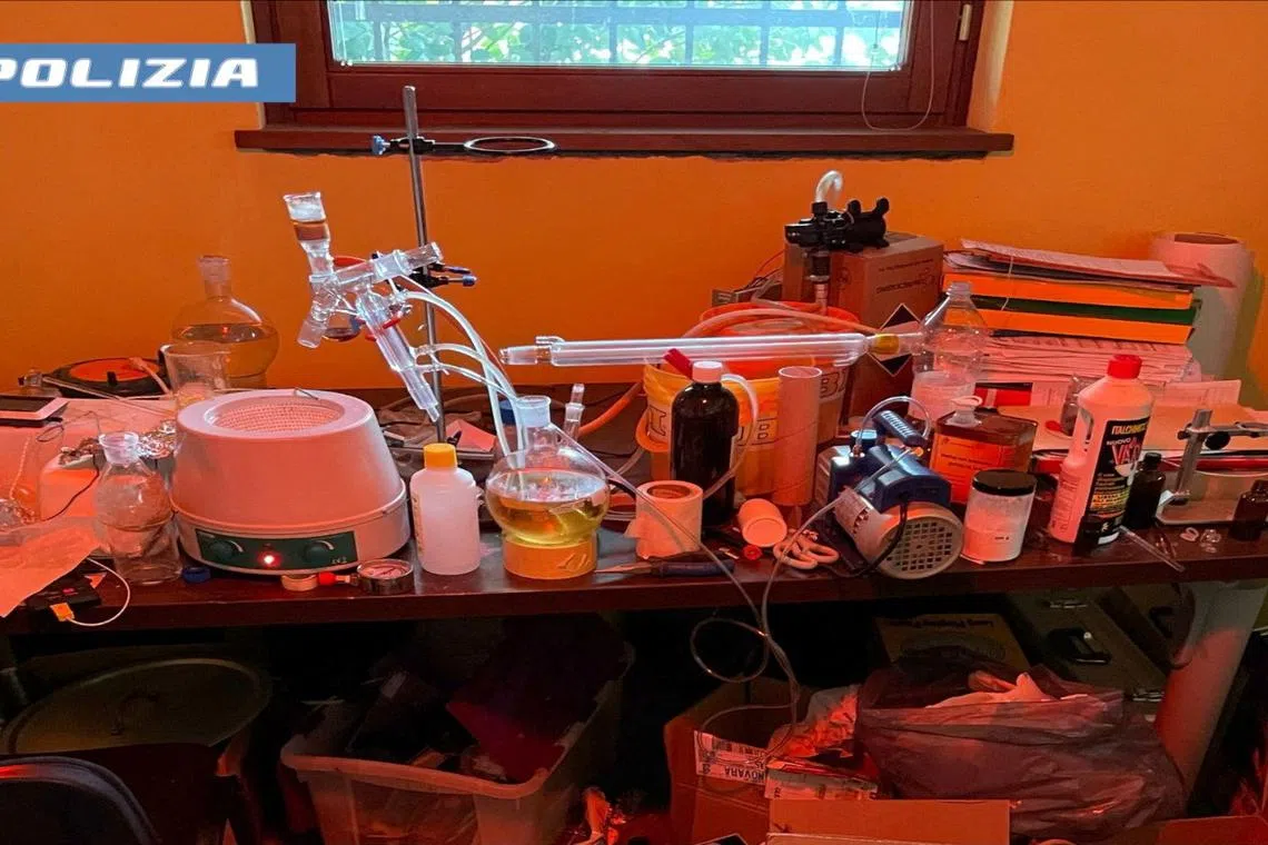 A screen grab from a video shows a general view of a clandestine drug laboratory uncovered by the Novara State Police, operated by a 22-year-old university student, in Novara, Italy, March 21, 2025. Italian Police/Handout via REUTERS