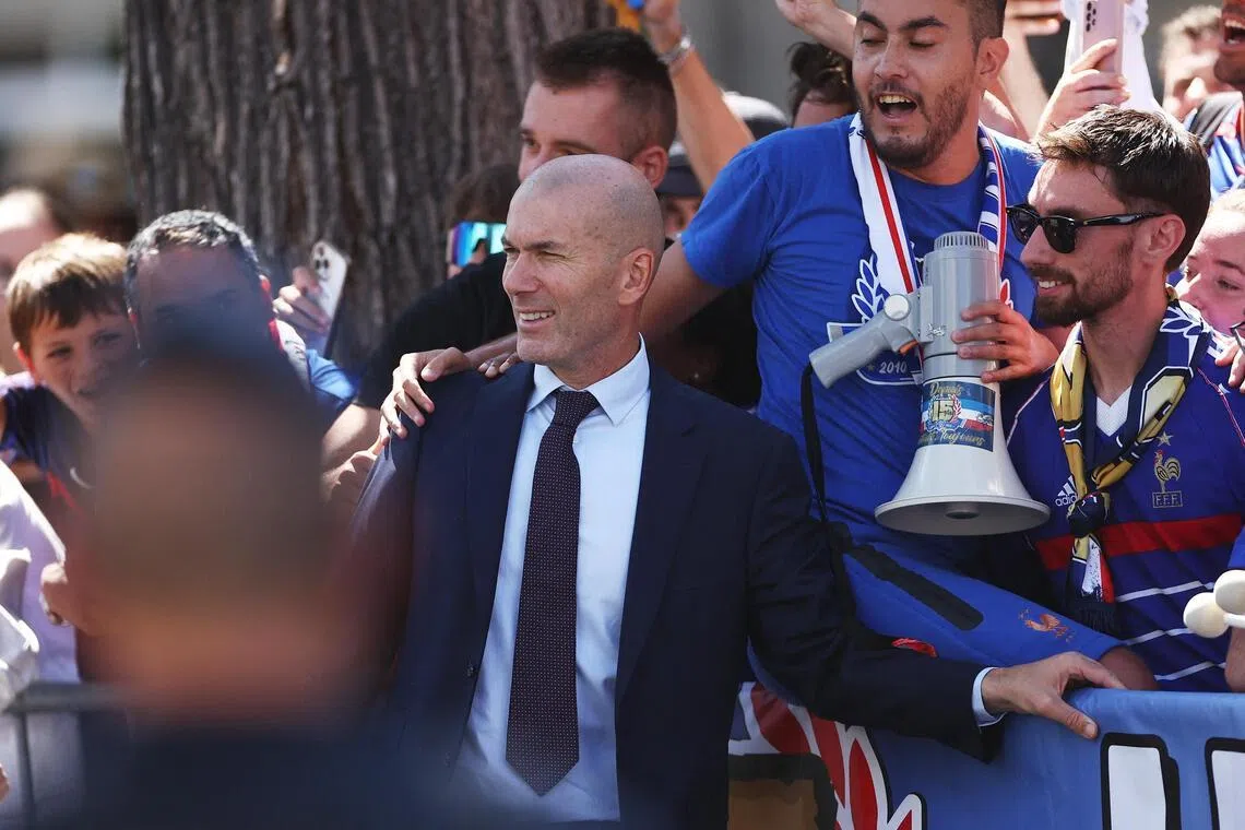 Zinedine Zidane with fans after he was unveiled as France’s new head coach at the federation’s headquarters in Paris on July 28, 2026.