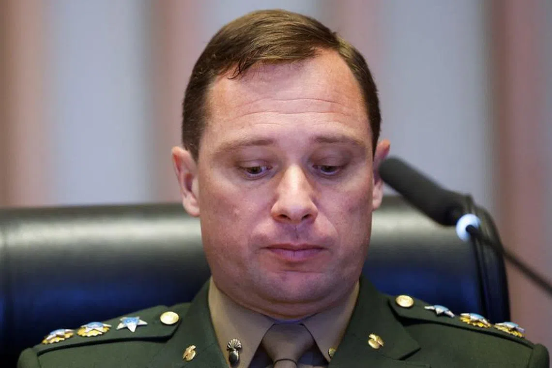 FILE PHOTO: Brazilian Army Lieutenant Colonel Mauro Cid, former aide of former Brazilian President Jair Bolsonaro attends a session of the commission investigating anti-democratic acts of January 8, in the legislative chamber of the Federal District, in Brasilia, Brazil, August 24, 2023. REUTERS/Adriano Machado/File Photo