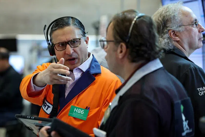 Futures-options traders work on the floor at the New York Stock Exchange in New York City, on June 8.