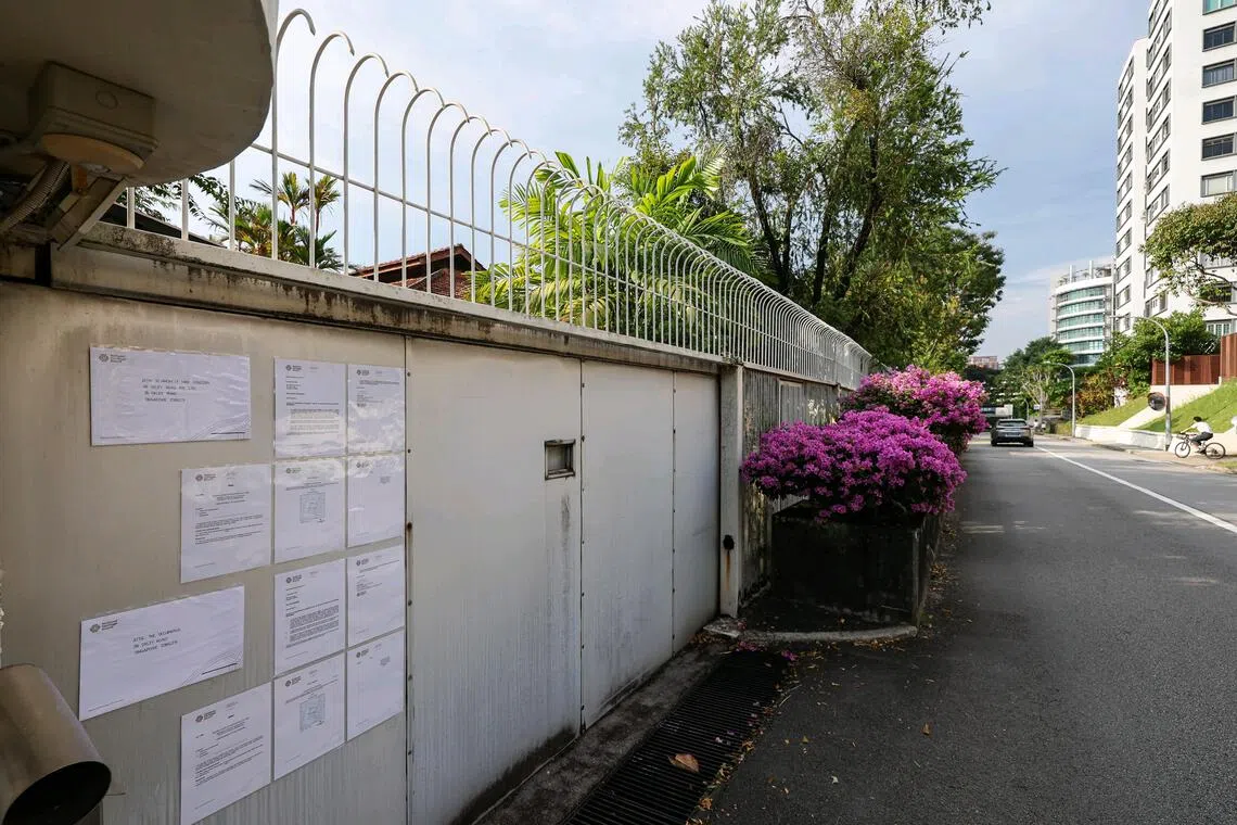 Written notice from the National Heritage Board pasted on the gate of 38 Oxley Road, informing its owner of the Government's intention to gazette the site as a national monument.