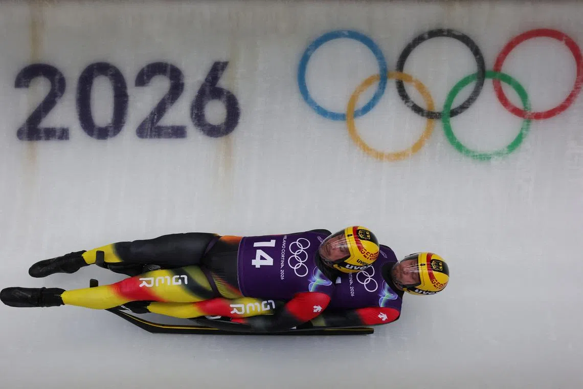 Milano Cortina 2026 Olympics - Luge - Men's Doubles Official Training Run 3 - Cortina Sliding Centre, Cortina d'Ampezzo, Italy - February 09, 2026.  Tobias Wendl and Tobias Arlt of Germany in action during training REUTERS/Athit Perawongmetha