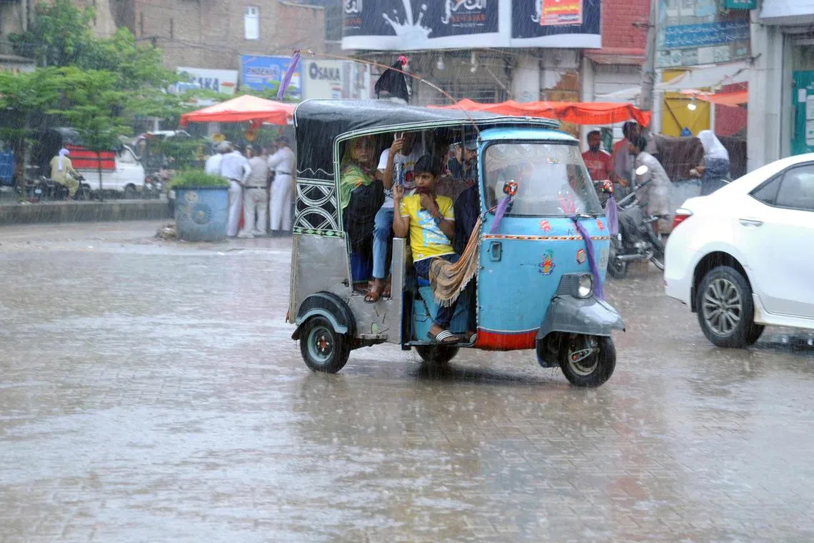 epa10766347 People make their way during heavy monsoon rains in Hyderabad, Pakistan, 24 July 2023. At least 13 people have been killed, with nine deaths in Khyber Pakhtunkhwa province and four in a landslide in the Skardu area following monsoon rains. With 74 houses damaged and flash floods prompting an emergency declaration in the Chitral district, the death toll since the start of the monsoon season has reached 101 according to provincial and national disaster management authorities. The Pakistan Meteorological Department (PMD) has issued a cautionary advisory to residents in the areas surrounding. The latest weather forecast predicts scattered to widespread wind thunderstorms and rain, ranging from moderate to heavy intensity. The monsoon season continues to impact various parts of South and Central Asia.  EPA-EFE/NADEEM KHAWAR