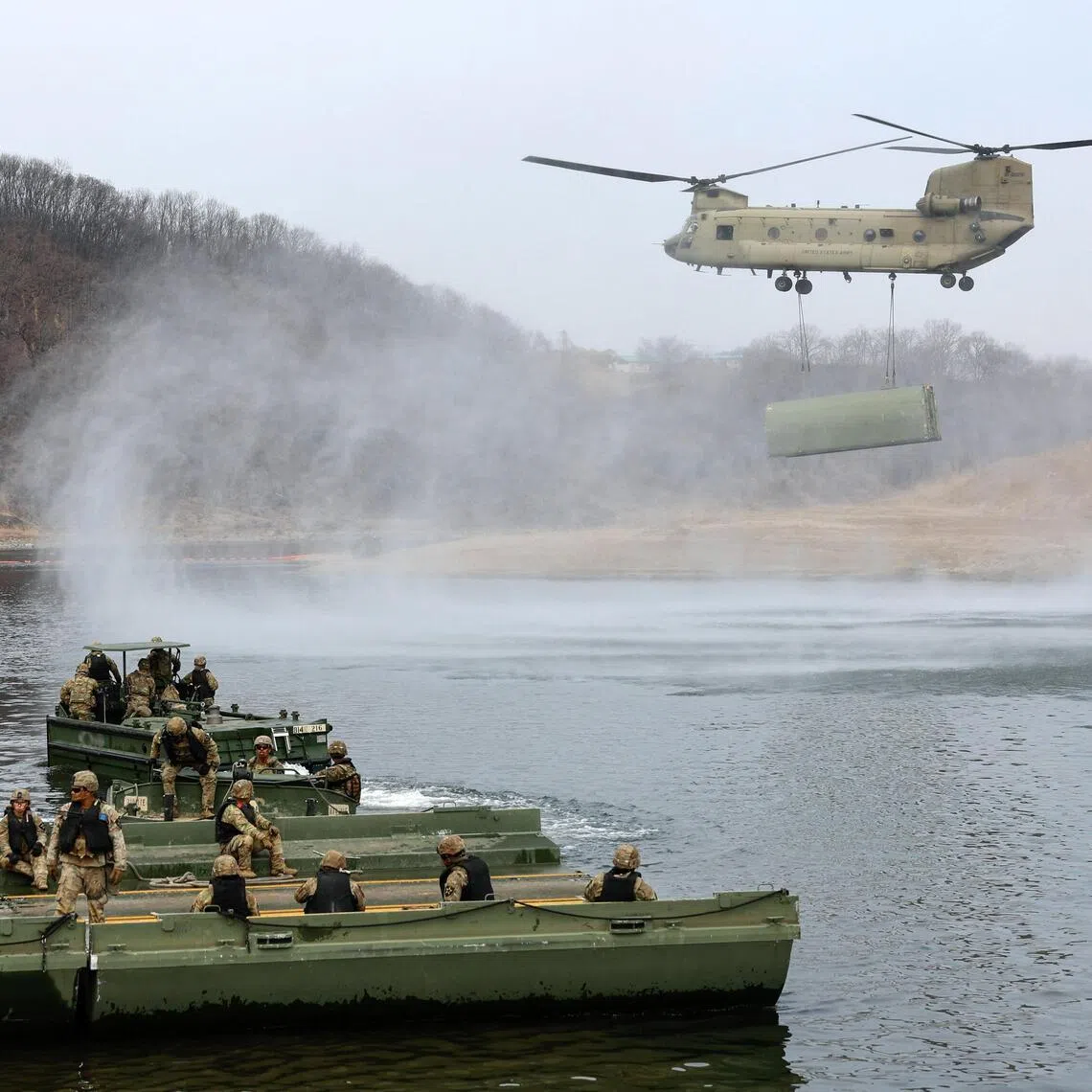 US army soldiers take part in a US-South Korea joint river-crossing exercise, which is a part of the annual Freedom Shield joint military training, near the demilitarised zone separating South and North Korea, in Yeoncheon, South Korea, on March 14, 2026. 