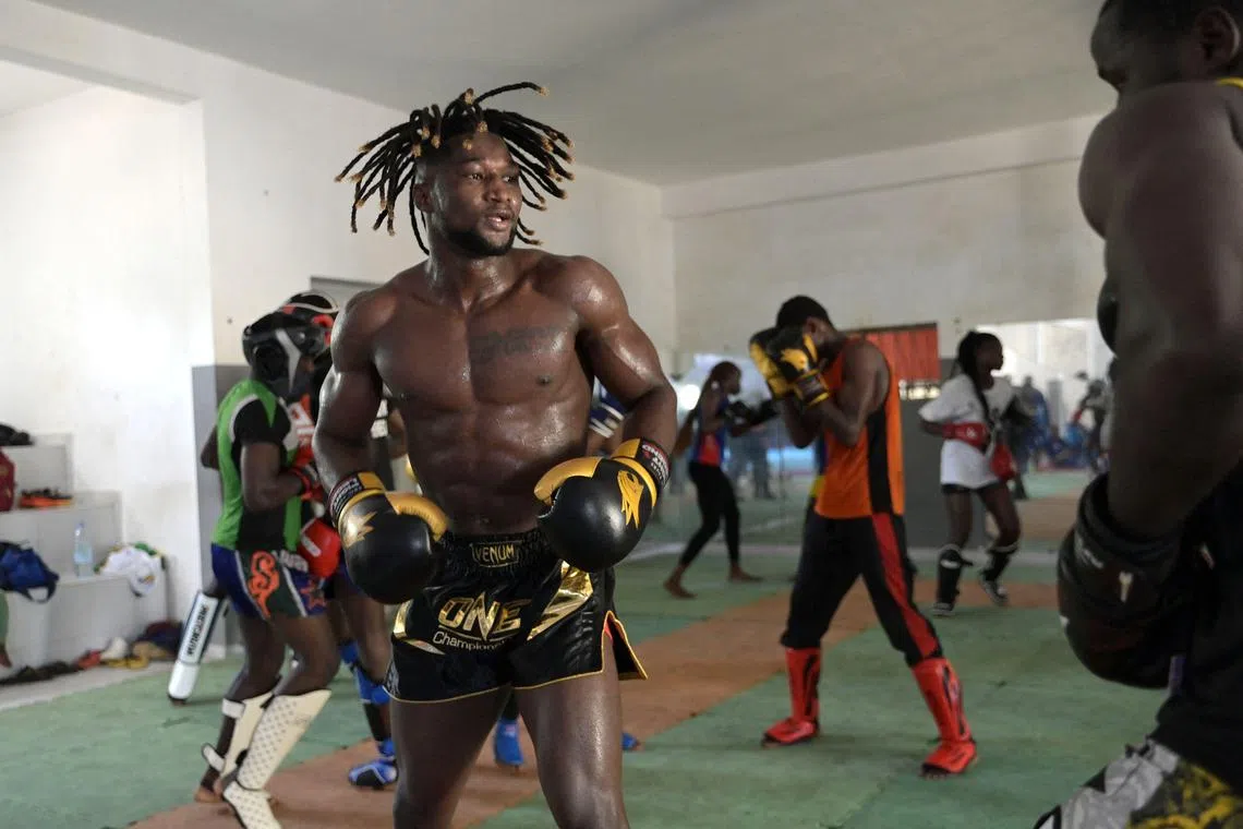 World Kickboxing Champion Mouhamed Tafsir Ba training at the sports hall of the Abdou Diass police camp in Senegal on Oct 13.
