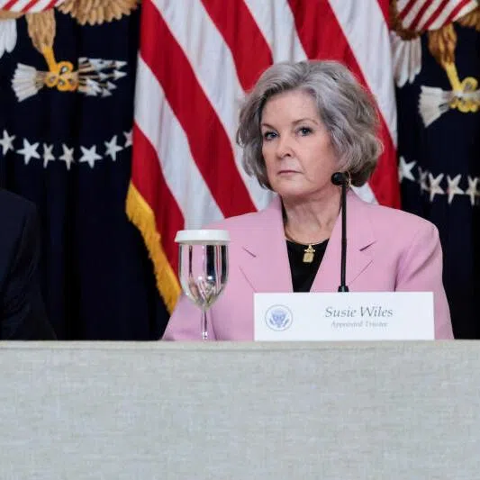 US President Donald Trump, flanked by White House chief of staff Susie Wiles, speaking in the East Room of the White House in Washington, on March 16.
