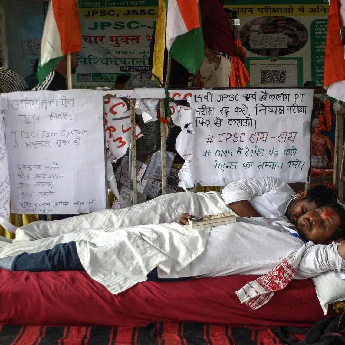 Students and job applicants on hunger strike are pictured during a sit-in protest against alleged irregularities in the Jharkhand Public Service Commission (JPSC) and Jharkhand Staff Selection Commission (JSSC) recruitment exams.