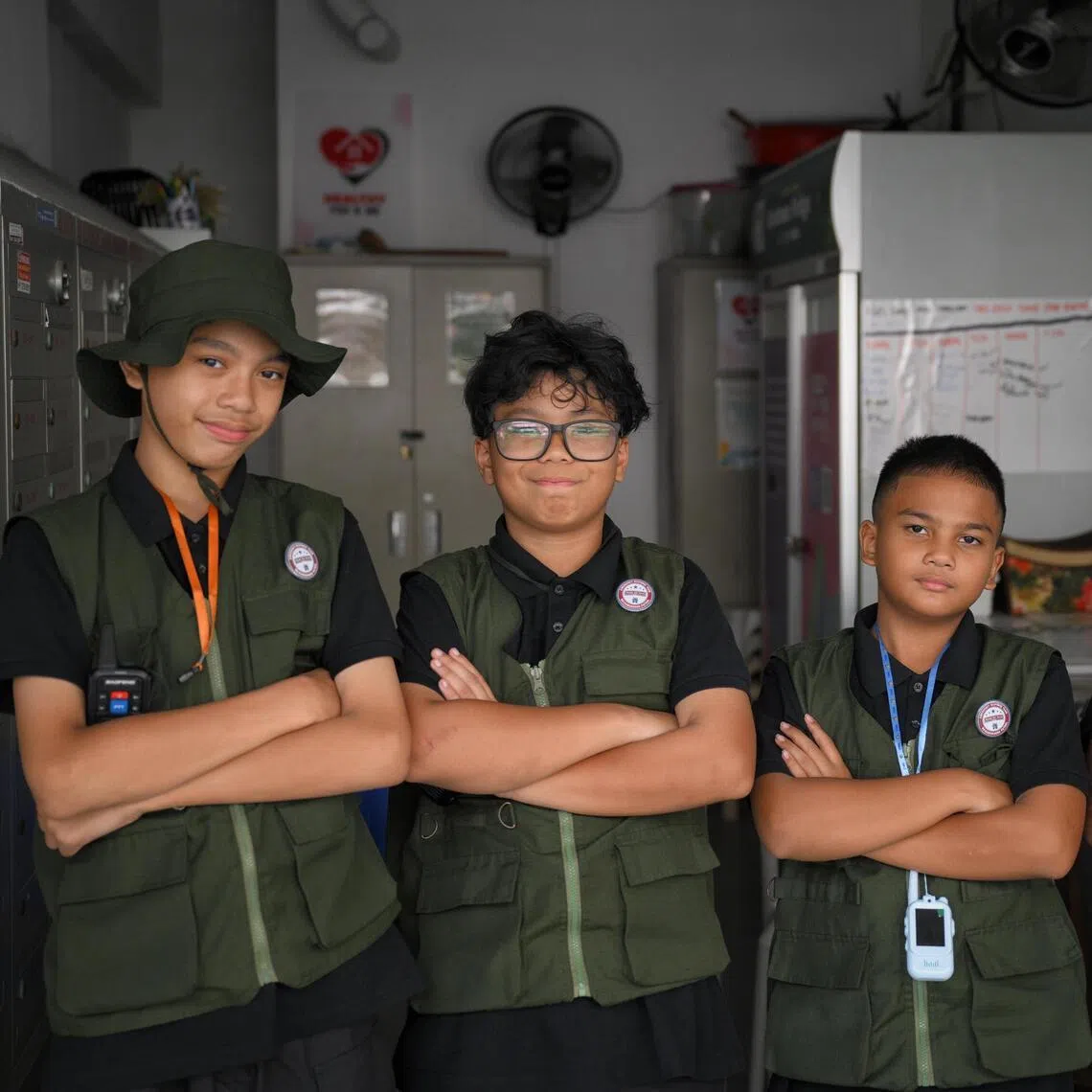 (From left) Didie Andiqa Muhaimin, 14, Rafieq Sahin Rafizal, 12, Al-Mirza Danish, 12, and Aaron Sarandev, 11, make up the Emergency Response Team LB (Lengkok Bahru), patrolling their neighbourhood every day to keep it safe.