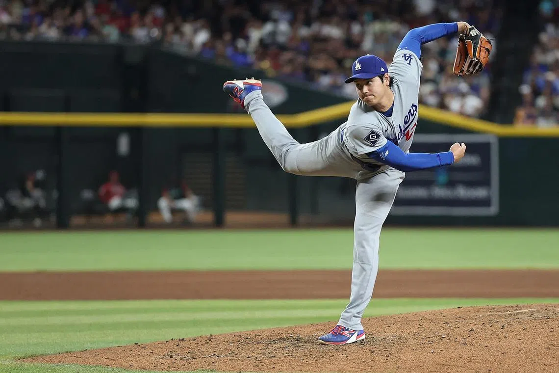 Los Angeles Dodgers pitcher Shohei Ohtani throws against the Arizona Diamondbacks during the fourth inning of an MLB game at Chase Field in Phoenix, Arizona, on June 3, 2026.
