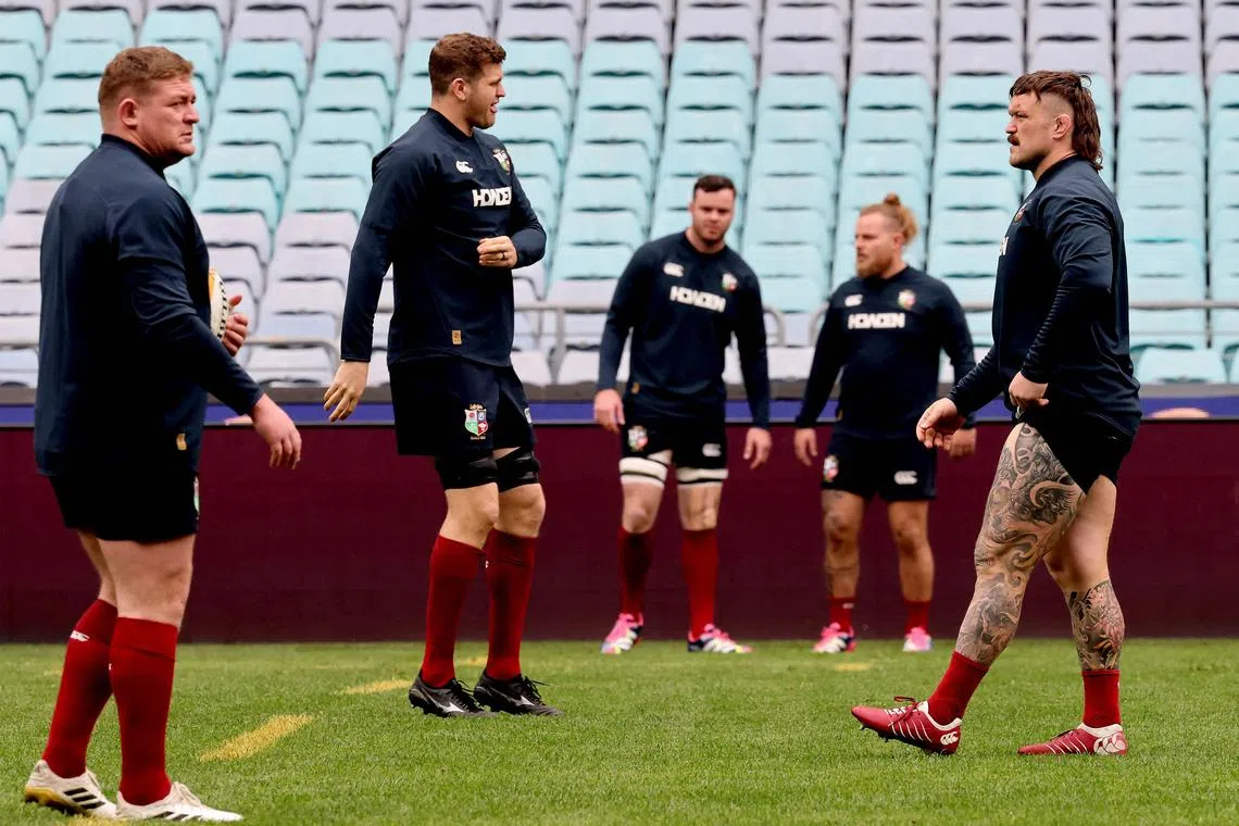 British and Irish Lions' Andrew Porter (right) joins teammates during the captain's run at Australia Stadium in Sydney on August 1, 2025, ahead of the final Rugby Union Test against the Australian Wallabies.