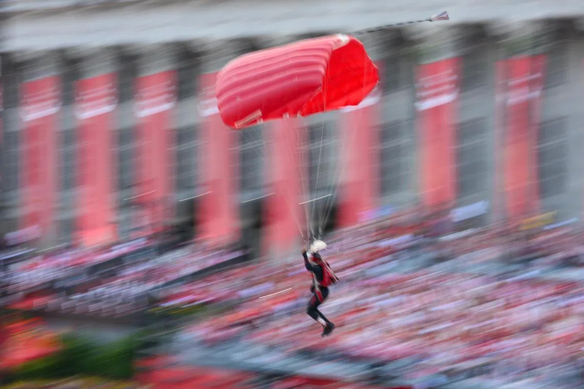 Red Lions parachuting to the Padang for the National Day Parade on Aug 9, 2025. ST PHOTO: SHINTARO TAY